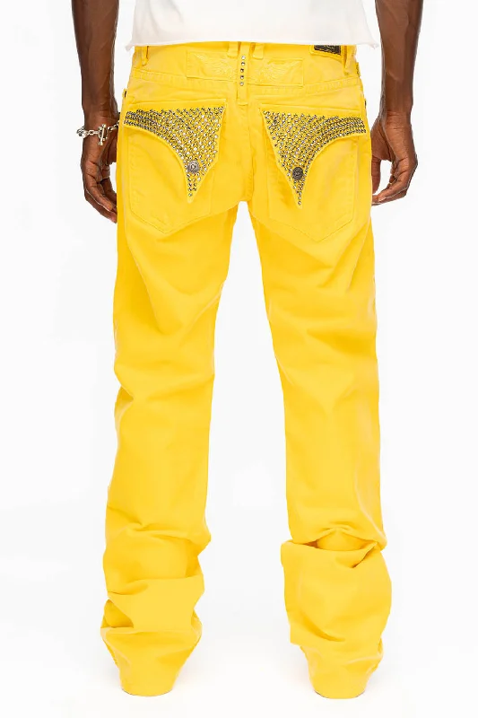 LONG FLAP JEANS WITH CRYSTALS IN YELLOW